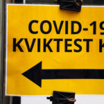 Covid -19 Kviktest kø skilte
